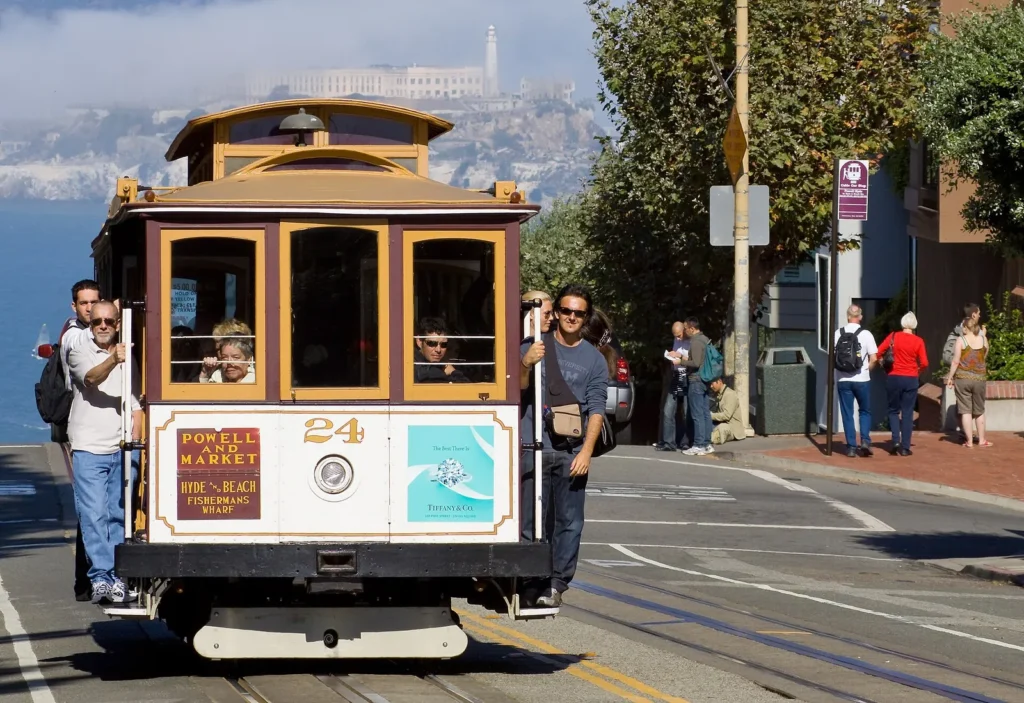 Powell-Hyde cable car climbing a hill in San Francisco