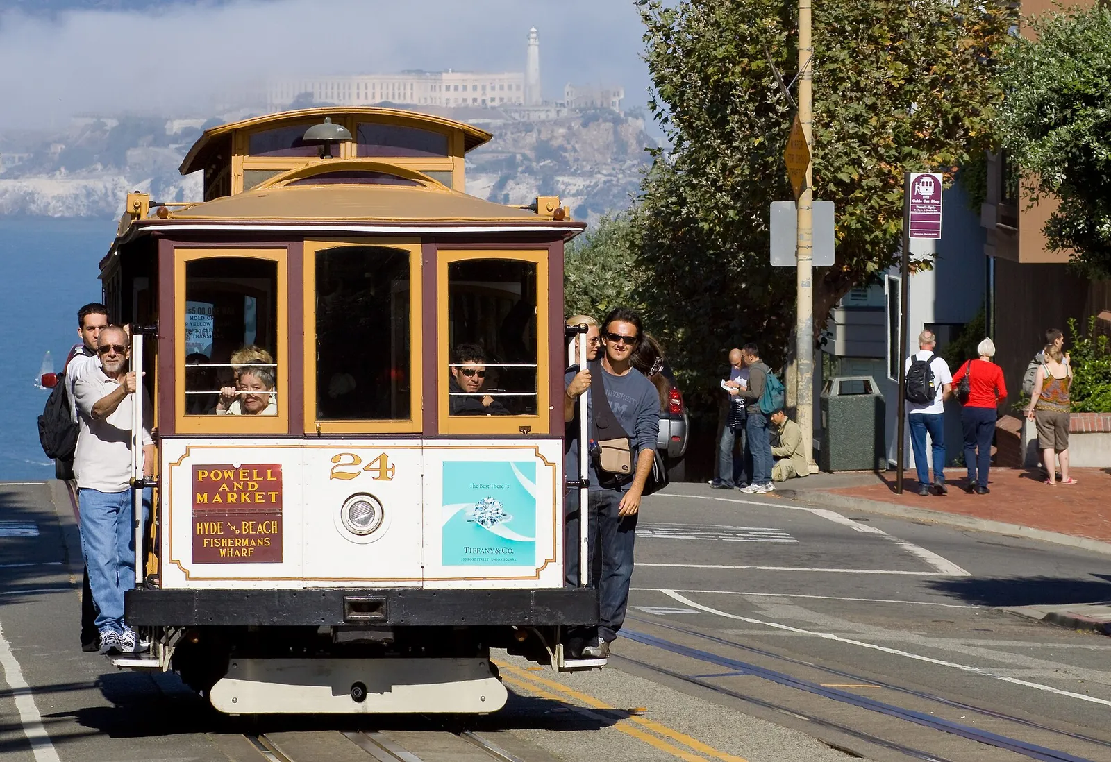 Powell-Hyde cable car climbing a hill in San Francisco