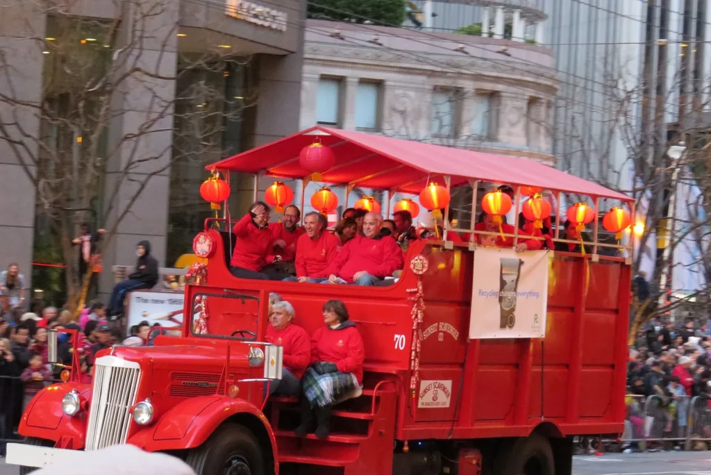 Red vintage fire truck with lanterns in the San Francisco Chinese New Year Parade