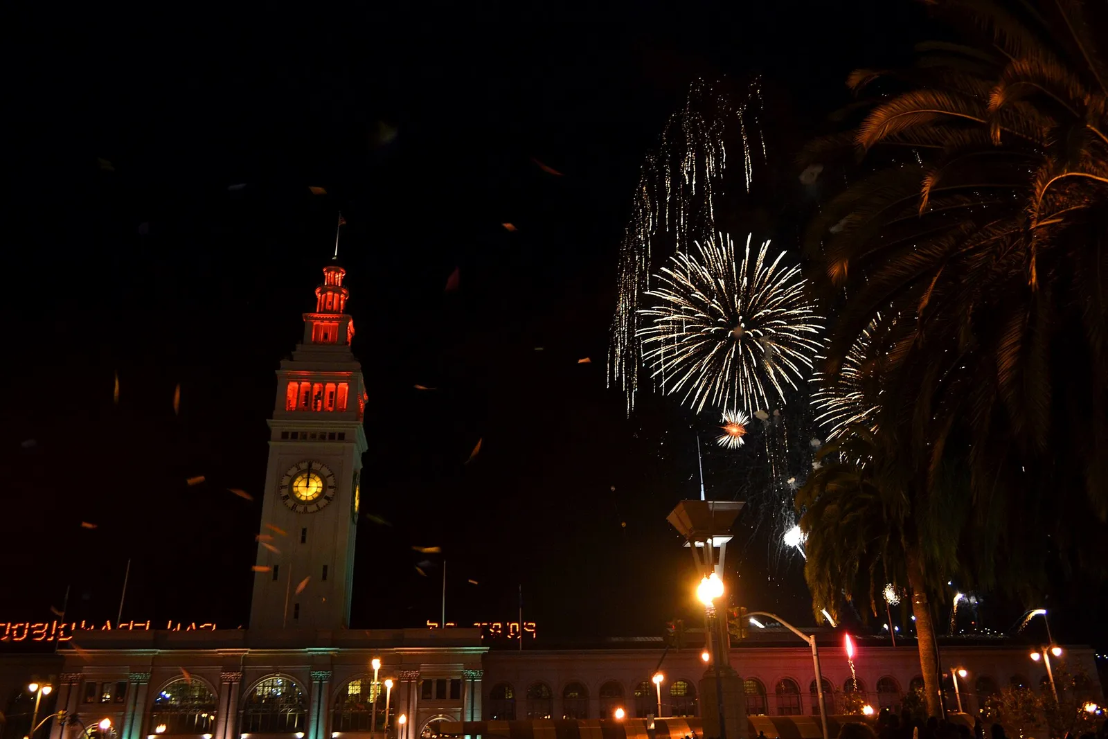 New Year fireworks over the Embarcadero beside the Ferry Building clock tower